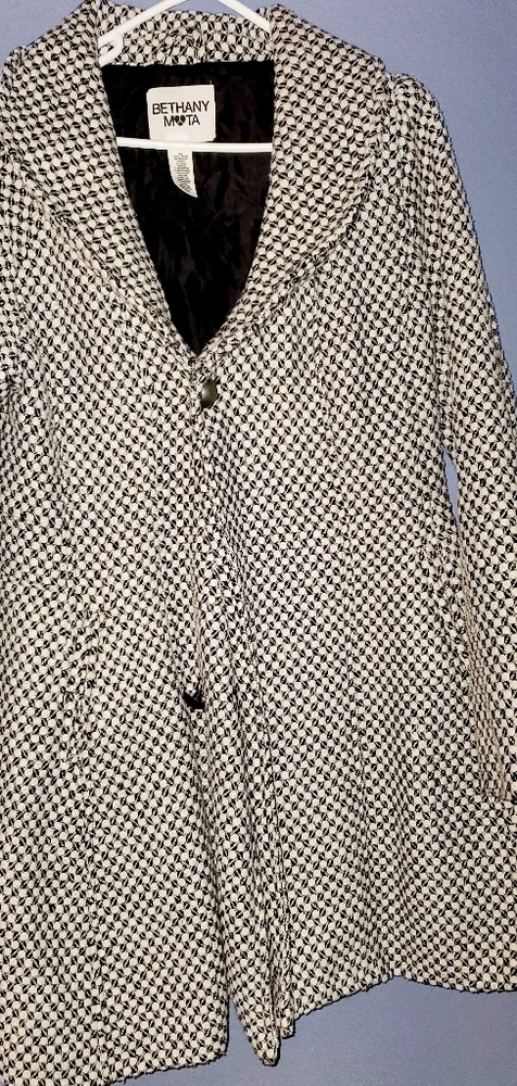 Bethany M🤍ta winter coat